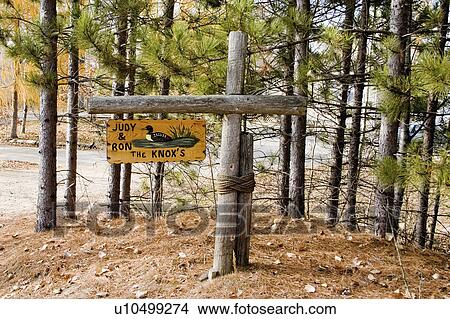 Picture - minnesota, sign, emily, woods, home, welcoming. Fotosearch
