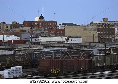 Stock Image - moon, moose, buildings, rising, full. Fotosearch