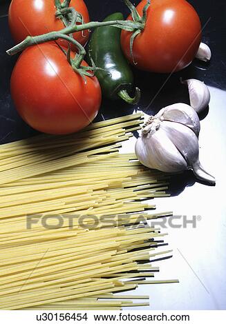 Picture - onion, spaghetti, nutritious, pasta, food, dry. Fotosearch