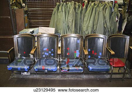 Stock Photography - patched, surplus, seats, theater, row. Fotosearch