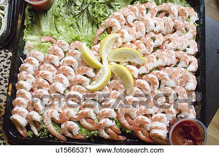 Stock Image - paul, shrimp, party, neighborhood, lemon, tray. Fotosearch