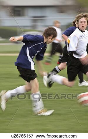 Stock Photo - playing, saskatchewan, regina, soccer, boys. Fotosearch