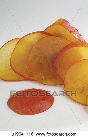 Stock Photograph - plum, fruit, background, white, sliced. Fotosearch