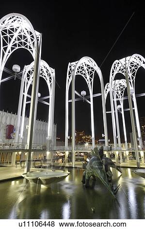 Stock Photo - pools, scene, wading, statues, dinasour, nighttime. Fotosearch