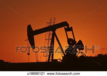 Stock Image - pump, oilfields, weyburn, jack, sunset. Fotosearch