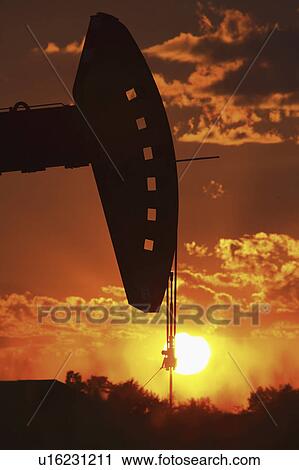 Stock Image - pump, setting, oil, mission, behind, sun. Fotosearch
