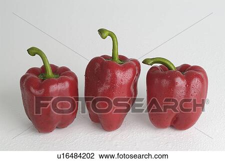Stock Image - red, background, white, peppers, three. Fotosearch