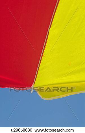 red, relax, yellow, umbrella, beach, place View Large Photo Image Stock Image - red, relax, yellow, umbrella, beach, place. Fotosearch
