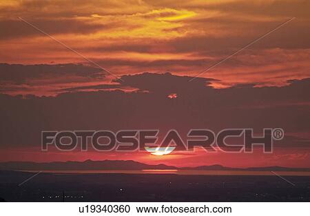 Stock Image - reflect, sunset, cloud, silouette, sunrise, sun. Fotosearch