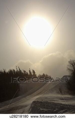Stock Image - road, clouds, winter, logging. Fotosearch