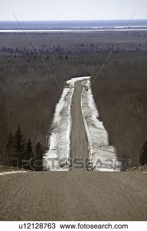 Stock Image - road, wilderness, winter, logging. Fotosearch