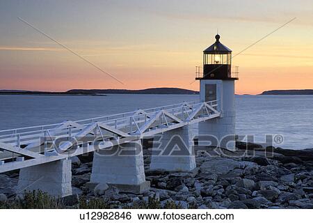 Stock Photograph - rock, buildings, coastline, house, light, ocean. Fotosearch