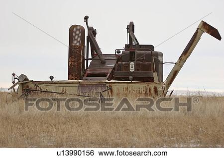 Stock Photograph - saskatchewan, abandoned, scenic, combine, cockshutt, old. Fotosearch