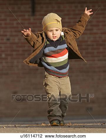 Stock Image - saskatchewan, boy, jaw, moose, posing, young. Fotosearch