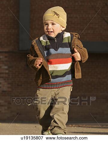 Stock Photo - saskatchewan, boy, jaw, moose, posing, young. Fotosearch