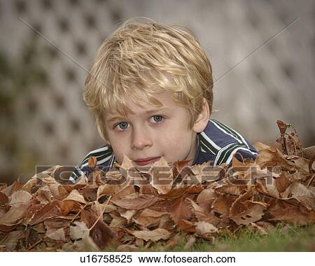 Stock Photography - saskatchewan, boy, jaw, moose, posing, young. Fotosearch
