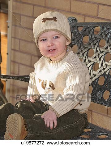 Stock Image - saskatchewan, boy, scenic, bench, sitting, young. Fotosearch