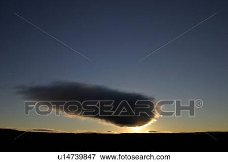 Stock Photo - saskatchewan, hiding, scenic, sun, setting, cloud. Fotosearch