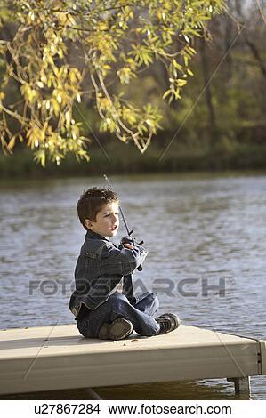 Picture - scenic, boy, dock, off, fishing, young. Fotosearch