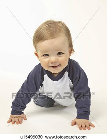 Stock Image - scenic, boy, jaw, moose, poses, young. Fotosearch