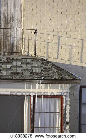 Stock Photo - scenic, eave, building, old, trough, icicles. Fotosearch