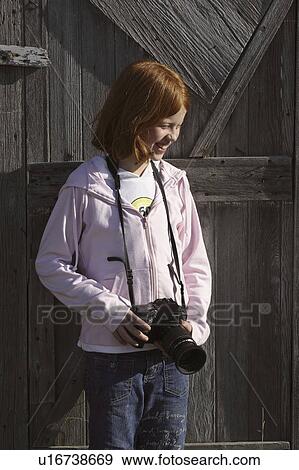Stock Photo - scenic, photographer, hearne, door, wooden, young. Fotosearch