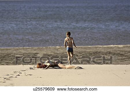 Stock Photo - scenic, young, lake, diefenbaker, girls, two. Fotosearch