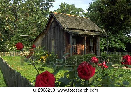 Stock Photo - seen, wooden, flowers, red, cabin, small. Fotosearch