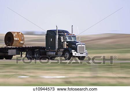 Stock Image - speeding, canada, trans, vehicle, blurred. Fotosearch