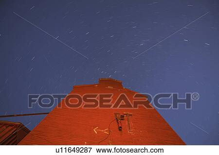 Stock Photo - starlit, valleys, elevator, grain, old, spring. Fotosearch