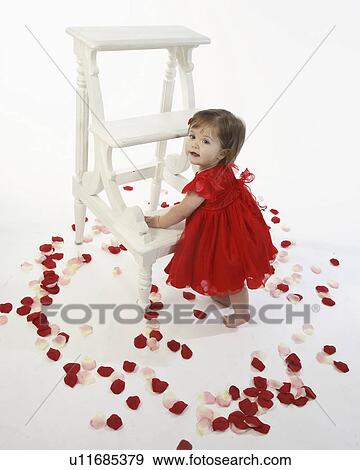 step, girl, holding, dress, red, little View Large Photo Image Stock Photo - step, girl, holding, dress, red, little. Fotosearch