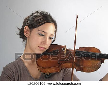 studio, female, violin, playing, violinist, young View Large Photo Image Stock Photo - studio, female, violin, playing, violinist, young. Fotosearch