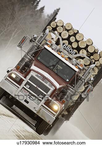 Picture - truck, hauling, road, winter, logging. Fotosearch