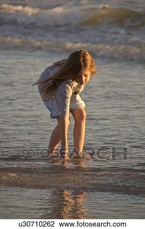 Stock Image - usa, enjoying, florida, scenic, beach, girl. Fotosearch