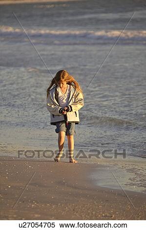 Stock Photography - usa, enjoying, florida, scenic, beach, girl. Fotosearch