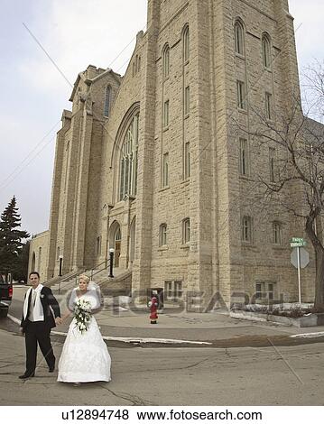 Stock Photo - weds, groom, newly, church, leaving, bride. Fotosearch