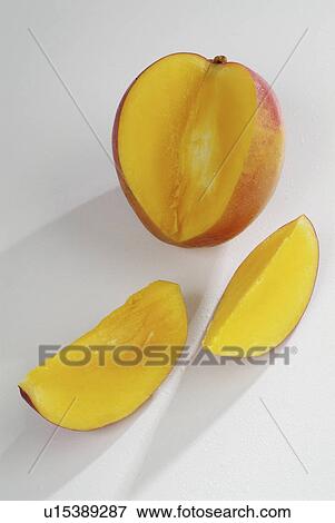 Stock Photo - white, cook, comestible, background, mango. Fotosearch