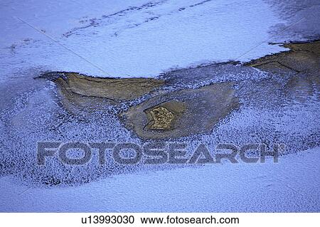 Stock Image - winter, open, rive, creek, water, ice. Fotosearch
