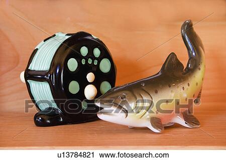 Stock Image - wisconsin, porcelain, cable, reel, trout, artistic. Fotosearch
