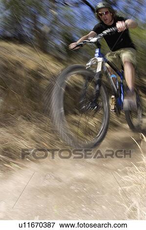 Stock Photo - young, through, riging, male, active. Fotosearch