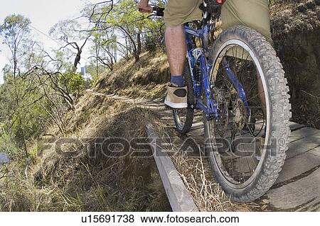 Stock Photo - young, through, riging, male, active. Fotosearch