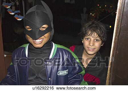 Stock Photograph - 11, halloween, age, treaters, trick, masked. Fotosearch