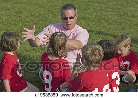 Stock Photo - 42, coach, age, players, advising, soccer. Fotosearch