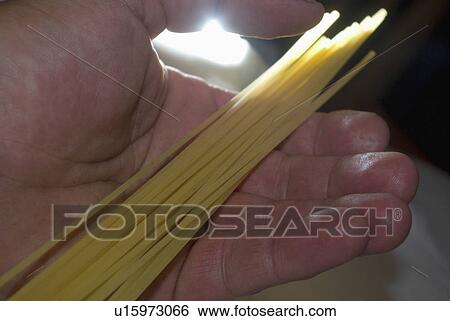 Stock Photograph - addendum, spaghetti, accessory, cuisine, food, dry. Fotosearch