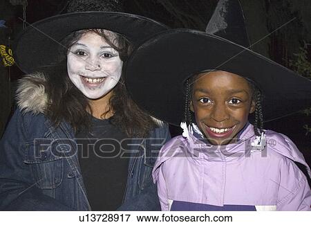 Stock Photo - age, costumed, treaters, trick, halloween, two. Fotosearch