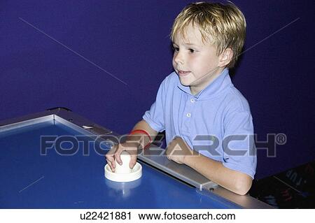 Stock Image - age, hockey, air, playing, boy. Fotosearch