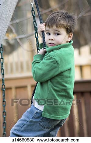 age, swing, backyard, playing, boy View Large Photo Image Stock Image - age, swing, backyard, playing, boy. Fotosearch