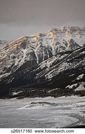 Stock Image - alberta, covered, rocky, winter, mountains, snow. Fotosearch