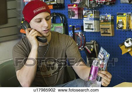 Stock Image - bike, phone, express, youth, merchandise, worker. Fotosearch