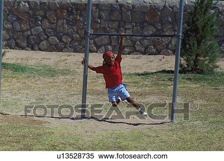 boy, kid, bar, parallel, swinging, child View Large Photo Image Stock Photography - boy, kid, bar, parallel, swinging, child. Fotosearch